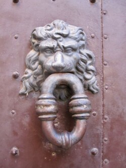 Door knocker in old-town Cosenza doors of Italy