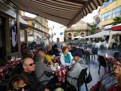 Enjoying gelato in a cafe in Pizzo Pizzo, Calabria